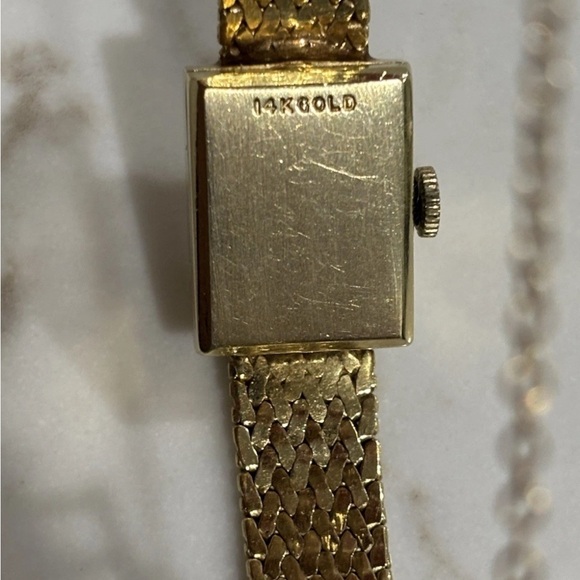 14K Ladies Hidden Watch with Floral Motif on Cover by Geneva 6.5” 23.74 grams - Picture 3 of 4